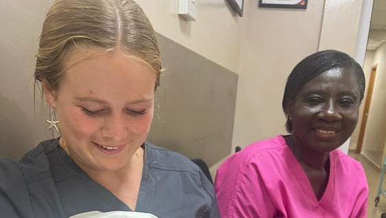 Our volunteer in the midwifery department after she helped deliver a bouncy baby boy