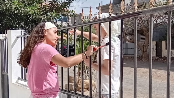 volunteers painting