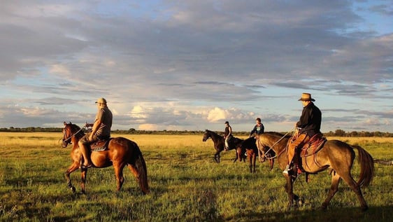 Previous volunteers outriding on the farm.