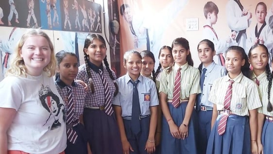 Volunteer running a learning session for children at a slum education project in Jaipur, India