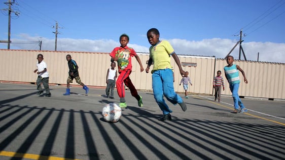 Children learning teamwork and communication through team sports