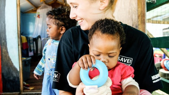 Volunteers provide educational assistance, as well as affection and attention for the children