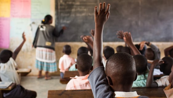 Volunteer teaching assistant in a primary school classroom in Nairobi, Kenya