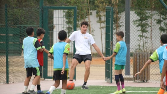 Volunteer teaching English at a community centre in Rabat, Morocco