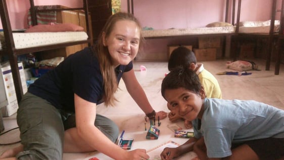 Volunteers working in childcare