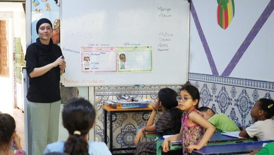 Volunteer running a sports session with young people in Rabat, Morocco