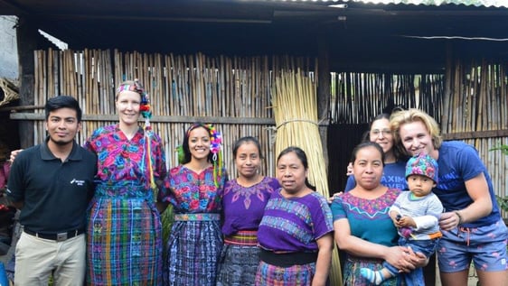 volunteers in Mayan dress