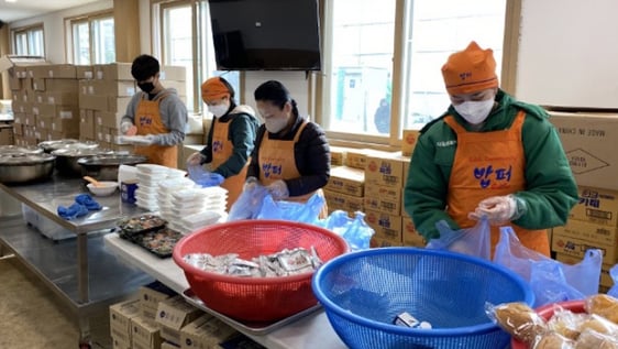 volunteers in soup kitchen