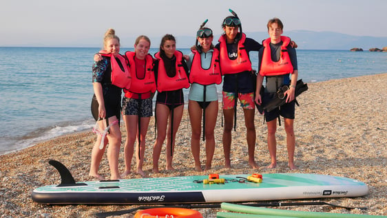 volunteers enter water to start their seagrass meadow survey