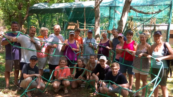 Volunteers making a colo-bridge