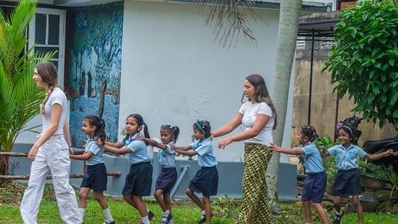 Volunteer working with young children at a kindergarten near Galle, Sri Lanka