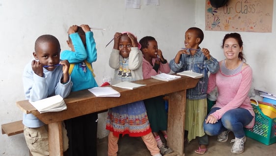 Volunteer with young children at a daycare centre in Arusha, Tanzania