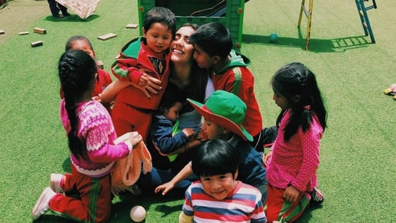 Volunteer with the children at a Cusco daycare centre