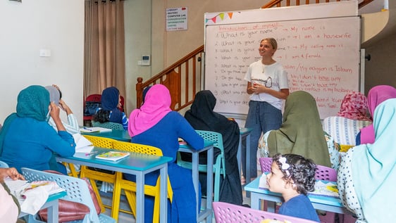 Volunteer running an English and life skills session with rural women near Galle, Sri Lanka