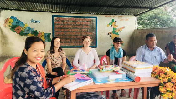 Teaching assistance volunteers in action.