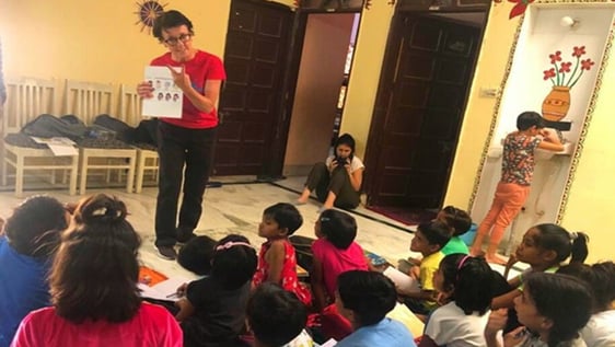 Volunteer running an afternoon session for children at the Jaipur shelter home