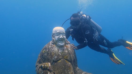 Exploring the underwater structure during our conservation project